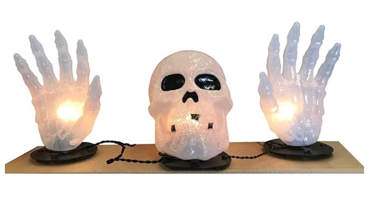 Afbeelding van Skull with hand light set