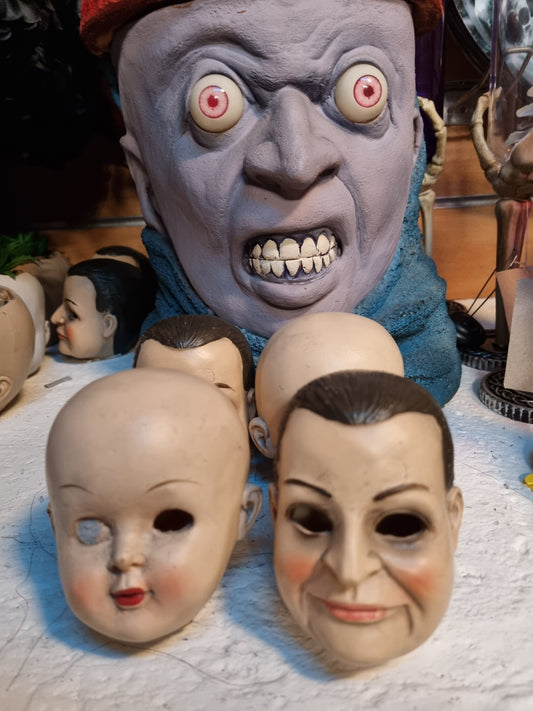 Afbeelding van Creepy doll head (raisin)